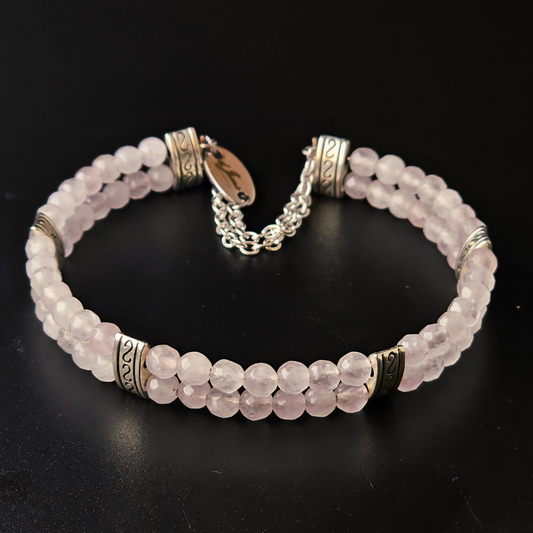 Rose Quartz 4mm Double Strand Bracelet featuring soft pink beads on silver-plated memory wire with a fixed safety chain