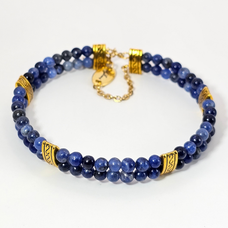 Sodalite 4mm Double Strand Bracelet featuring calming blue beads on silver-plated memory wire with a fixed safety chain.