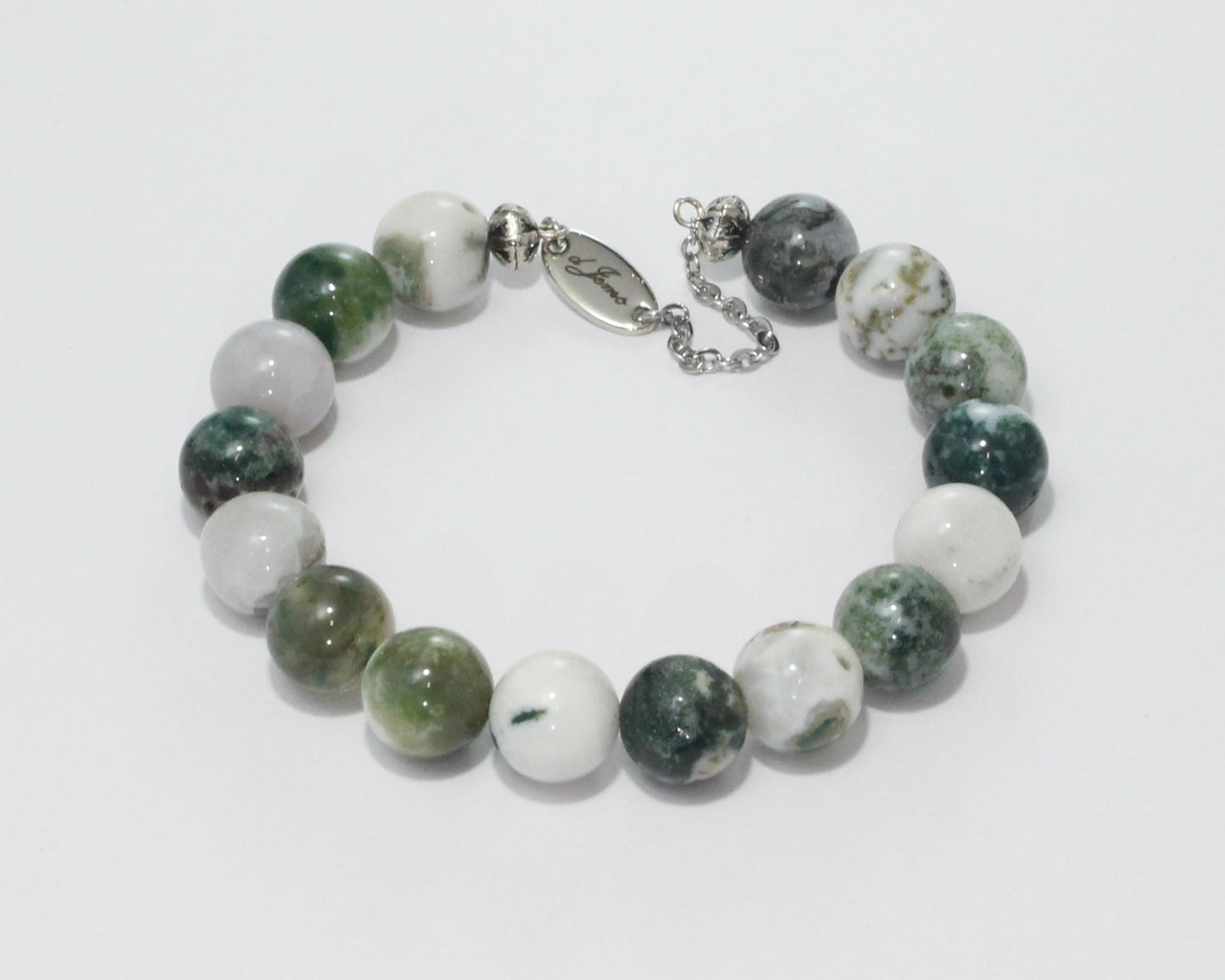 Handmade Glossy Tree Agate Bracelet showcasing 10mm glossy tree agate beads with dendritic patterns on plated stainless steel memory wire with a fixed safety chain.