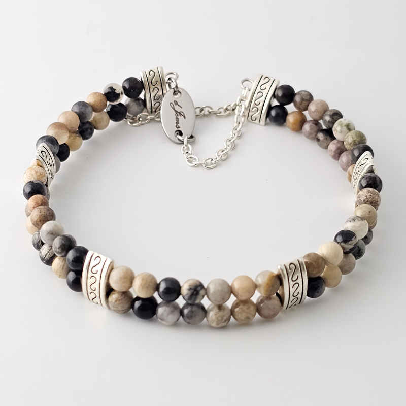 Crazy Lace Agate Silver Double Strand Bracelet showcasing 4mm beads with swirling patterns in grey, cream, and silver tones on silver-plated memory wire, secured with a fixed safety chain.
