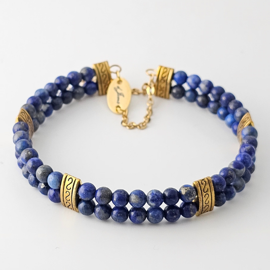 Lapis Lazuli 4mm Double Strand Bracelet featuring deep blue beads with gold pyrite inclusions on silver-plated memory wire with a fixed safety chain.