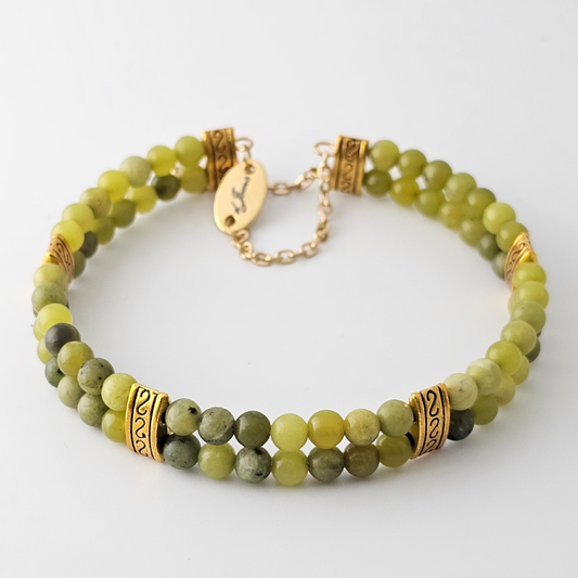 Taiwan Jade 4mm Double Strand Bracelet featuring smooth green beads on silver-plated memory wire with a fixed safety chain.