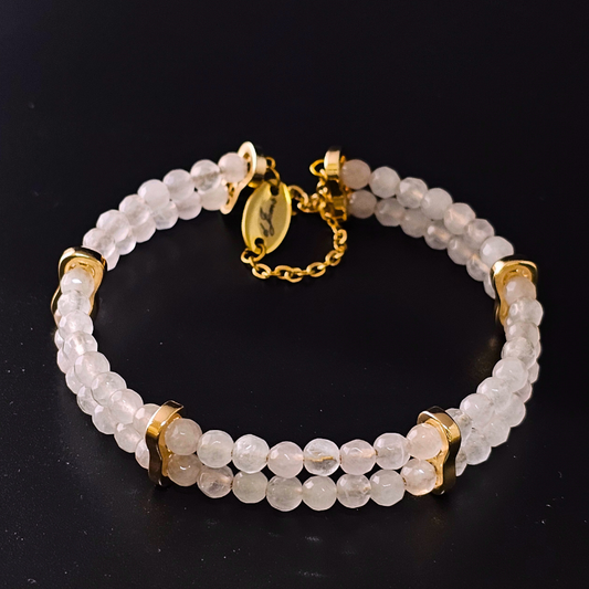 Rose Quartz 4mm Double Strand Bracelet featuring soft pink beads on silver-plated memory wire with a fixed safety chain.