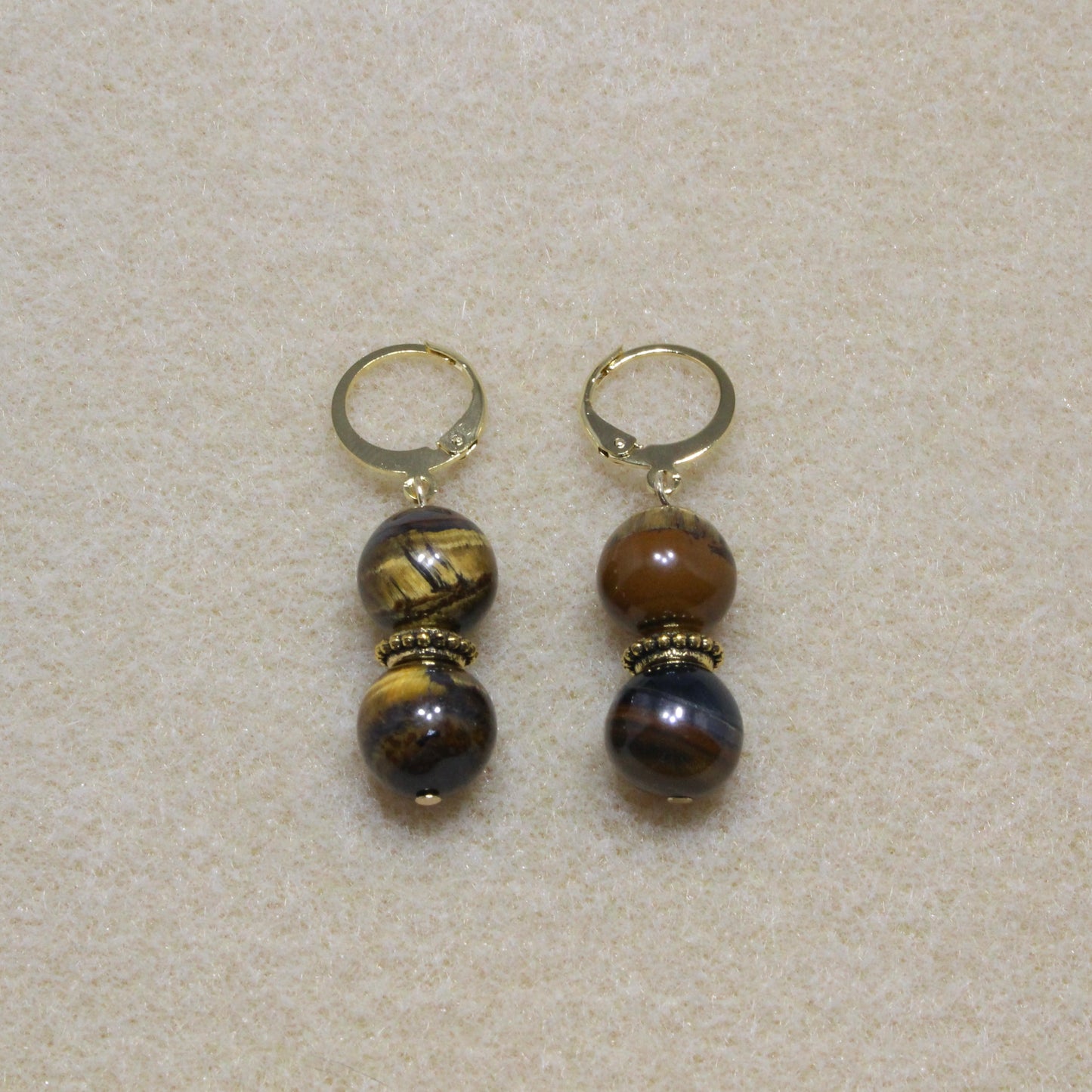 Pair of Brown Tiger's Eye Drop Earrings with 10mm beads and lever-back closures, showcasing the stone's warm golden-brown hues.