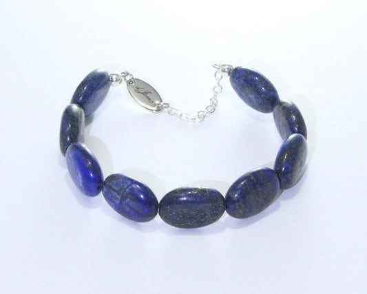 Close-up image of Lapis Lazuli Oval Bracelet showcasing large 16mm deep blue oval beads with natural veining.