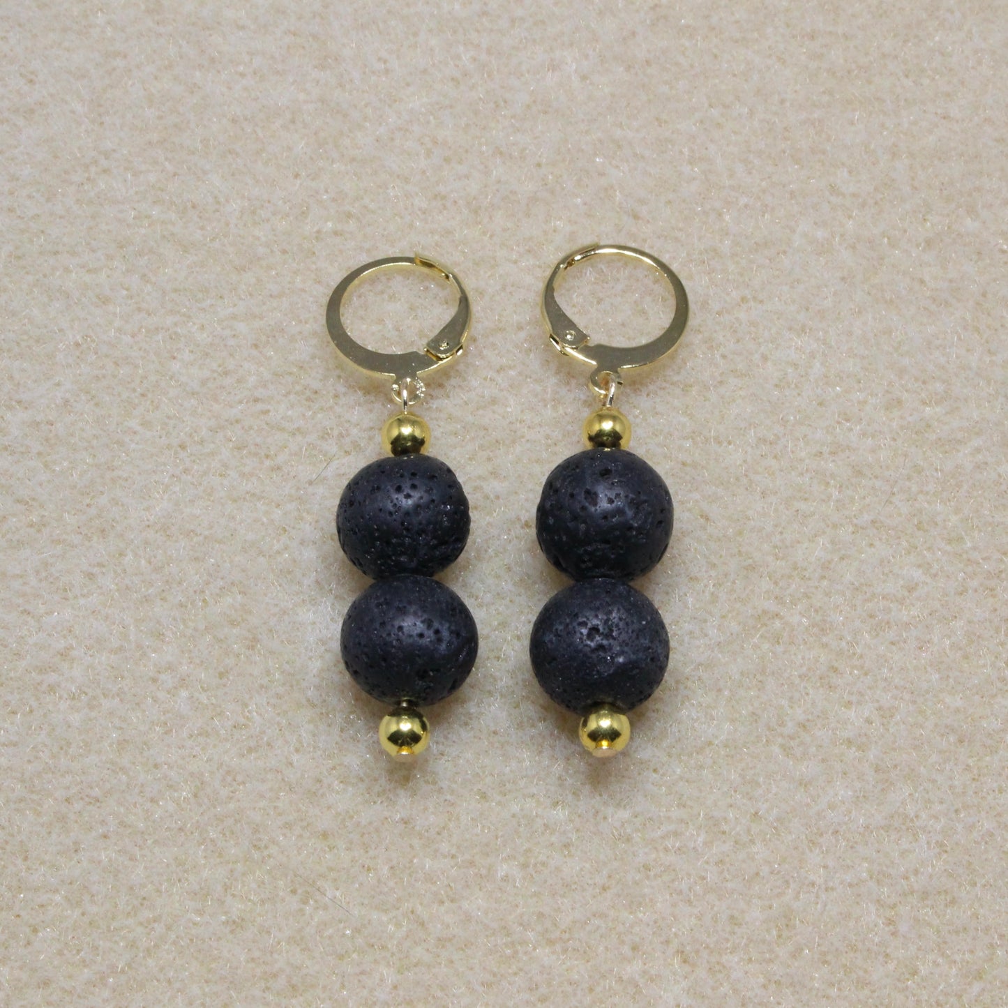 Black Lava Rock Drop Earrings featuring natural porous stones with lever-back closures, ideal for diffusing essential oils.