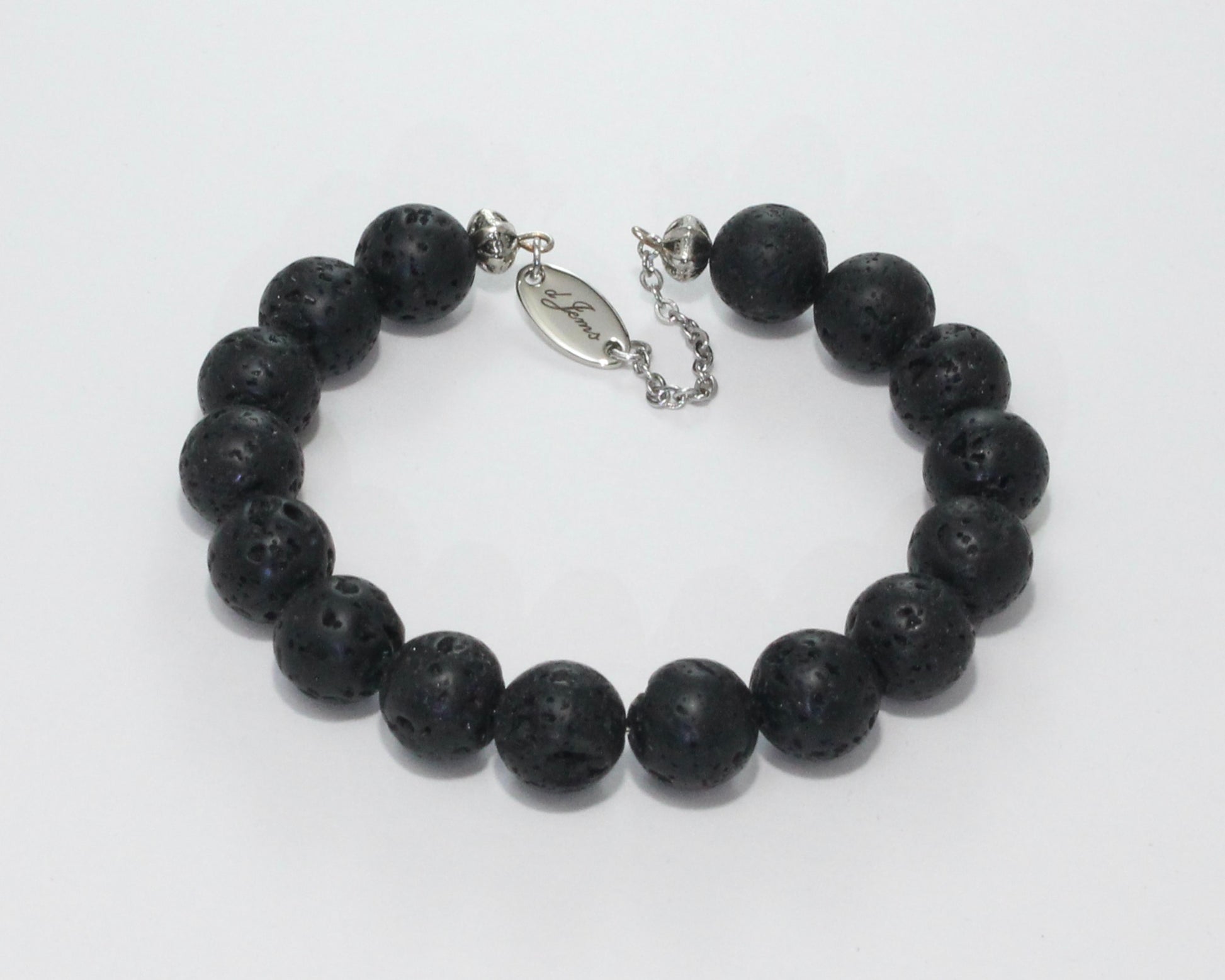 Handmade Black Lava Rock Bracelet showcasing 10mm natural lava rock beads on plated stainless steel memory wire with a fixed safety chain.