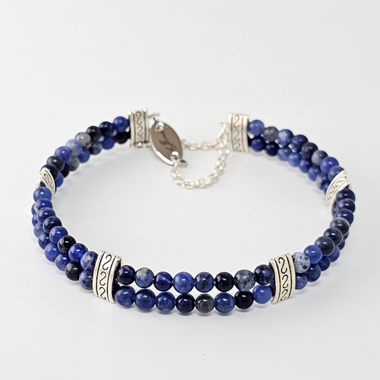 Sodalite 4mm Double Strand Bracelet featuring calming blue beads on silver-plated memory wire with a fixed safety chain.
