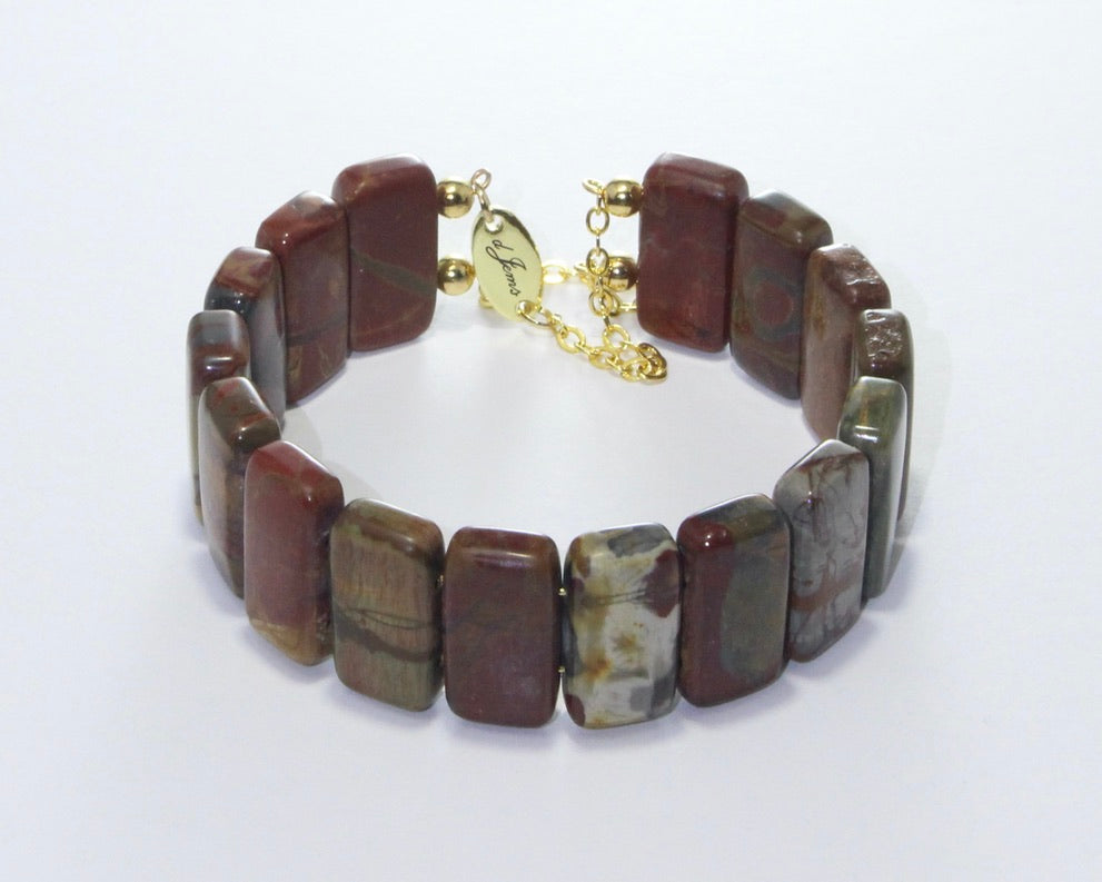 Handmade Red Creek Jasper Bracelet showcasing 20x10mm earthy-toned jasper beads with unique patterns on plated stainless steel memory wire with a fixed safety chain.
