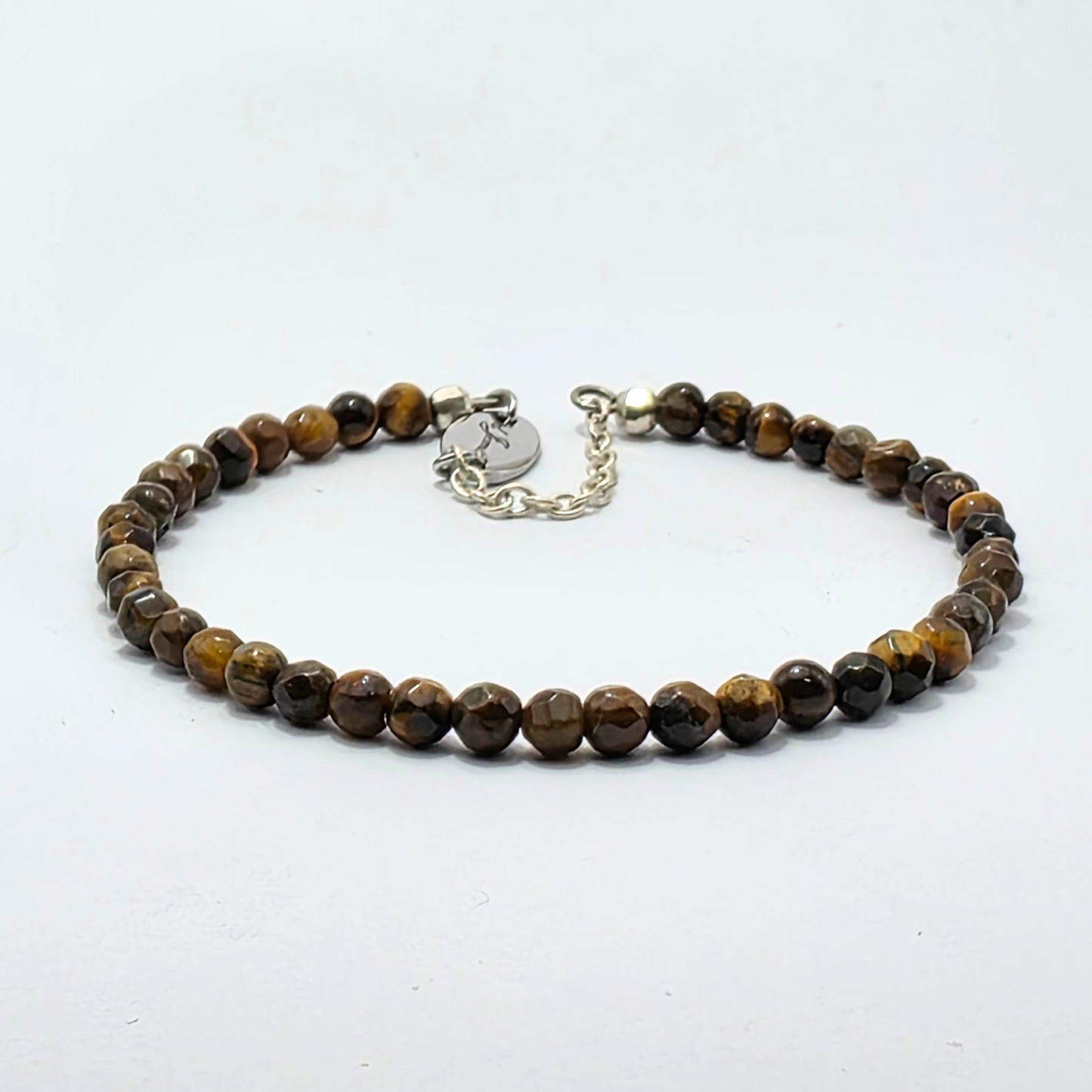 Brown Tigers Eye Facetted 4mm Sigle Strand