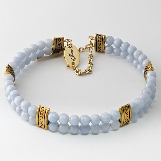 Amazonite 4mm Double Strand Bracelet featuring soothing blue-green beads on silver-plated memory wire, secured with a fixed safety chain.