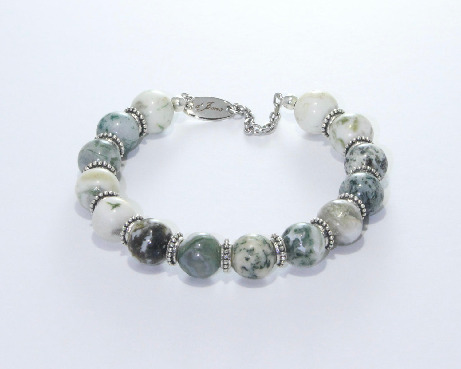 Handmade Glossy Tree Agate Bracelet showcasing 10mm glossy tree agate beads with dendritic patterns and elegant spacers on plated stainless steel memory wire with a fixed safety chain.