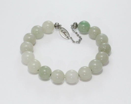Handmade Jade Bracelet showcasing 10mm natural jade beads on plated stainless steel memory wire with a fixed safety chain.