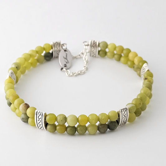 Taiwan Jade 4mm Double Strand Bracelet featuring smooth green beads on silver-plated memory wire with a fixed safety chain.