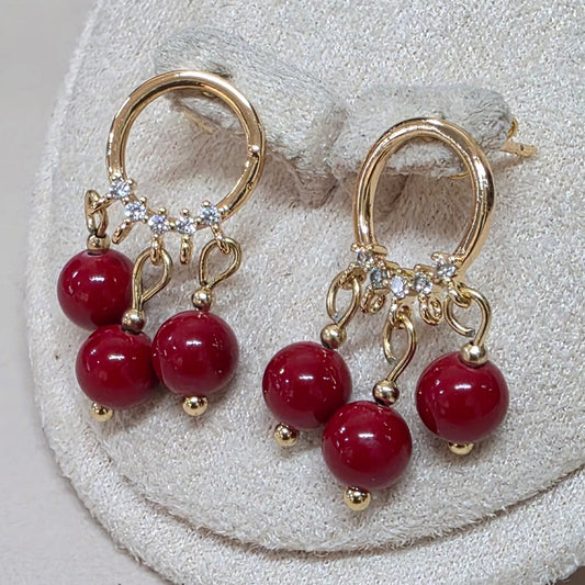 3 red cinnabar in earrings