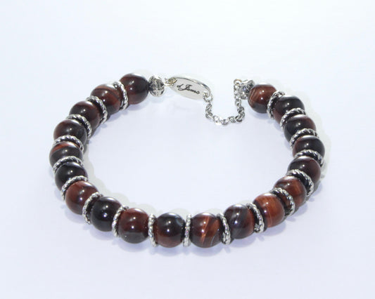 Handmade Red Tiger's Eye Bracelet showcasing 10mm deep red beads on plated stainless steel memory wire with a fixed safety chain.

