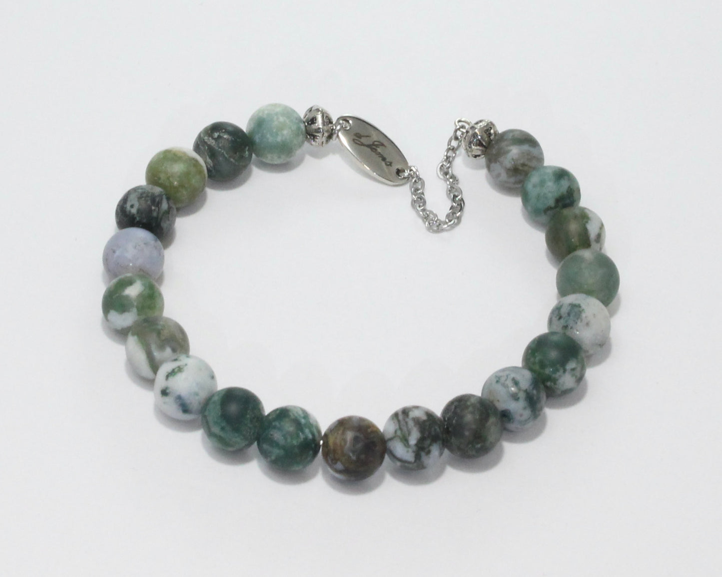 Handmade Matte Tree Agate Bracelet showcasing 8mm frosted green and white beads on plated stainless steel memory wire with a fixed safety chain.
