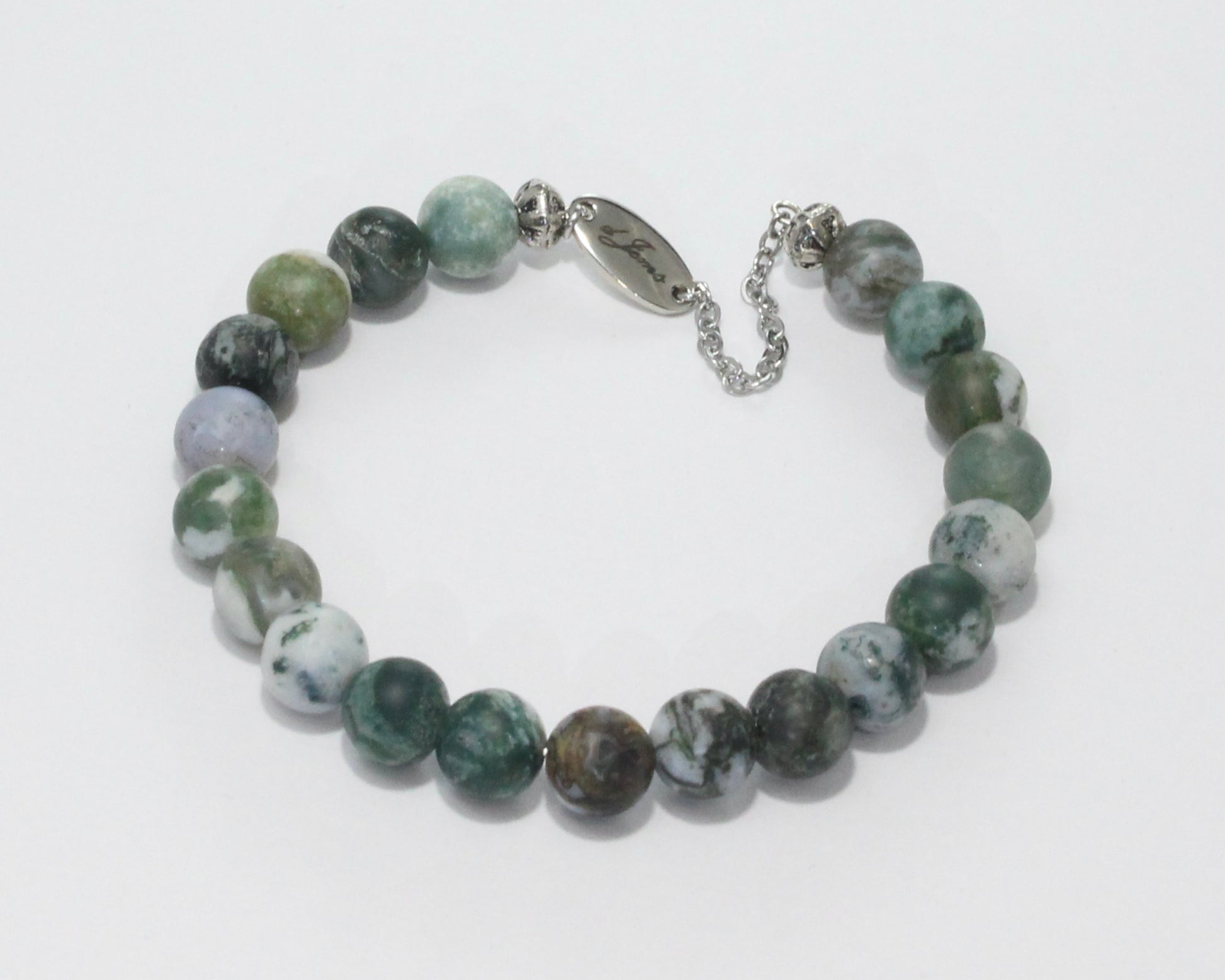 Handmade Matte Tree Agate Bracelet showcasing 8mm frosted green and white beads on plated stainless steel memory wire with a fixed safety chain.
